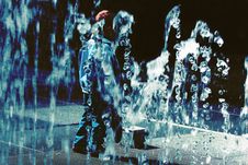 Child Playing With Water Royalty Free Stock Images