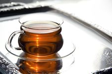 Transparent Cup Of Tea On The Salver Royalty Free Stock Photography