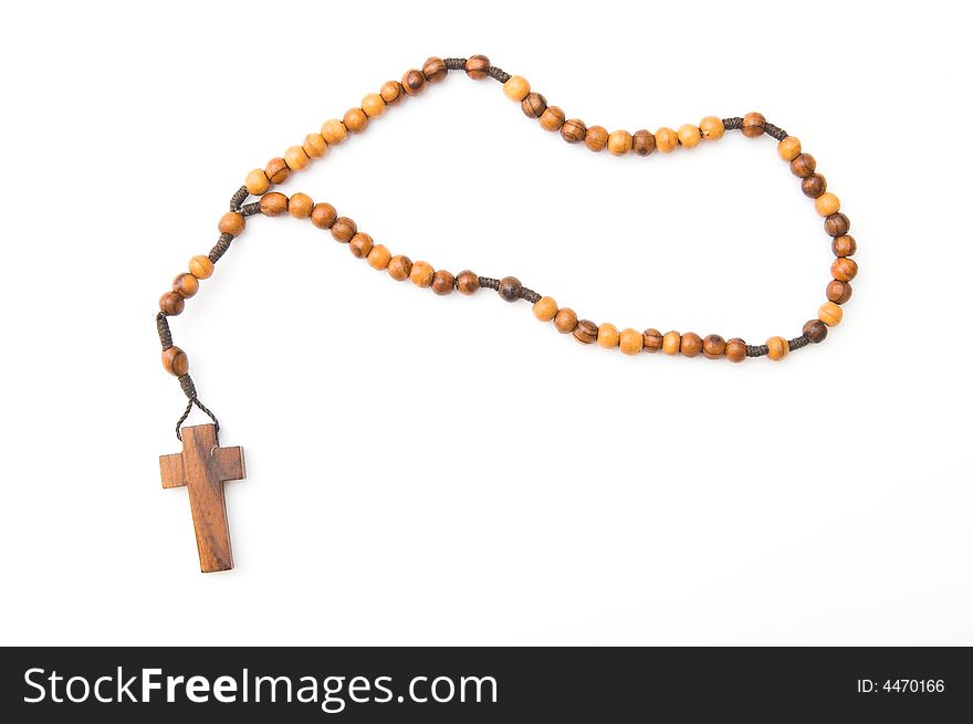 Wooden rosary isolated over white