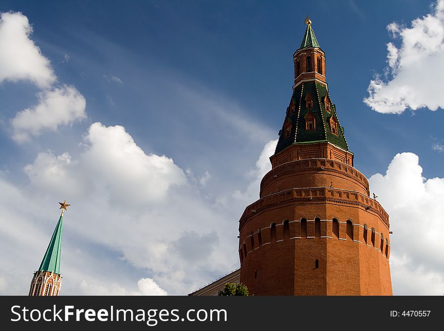 Old Russian outstanding memorial - fortified wall with towers from red brick, detail of Kremlin fortress in Moscow. Old Russian outstanding memorial - fortified wall with towers from red brick, detail of Kremlin fortress in Moscow