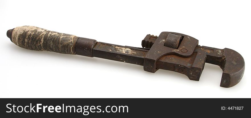 Old vintage taped wooden handle rusty pipe wrench. Old vintage taped wooden handle rusty pipe wrench