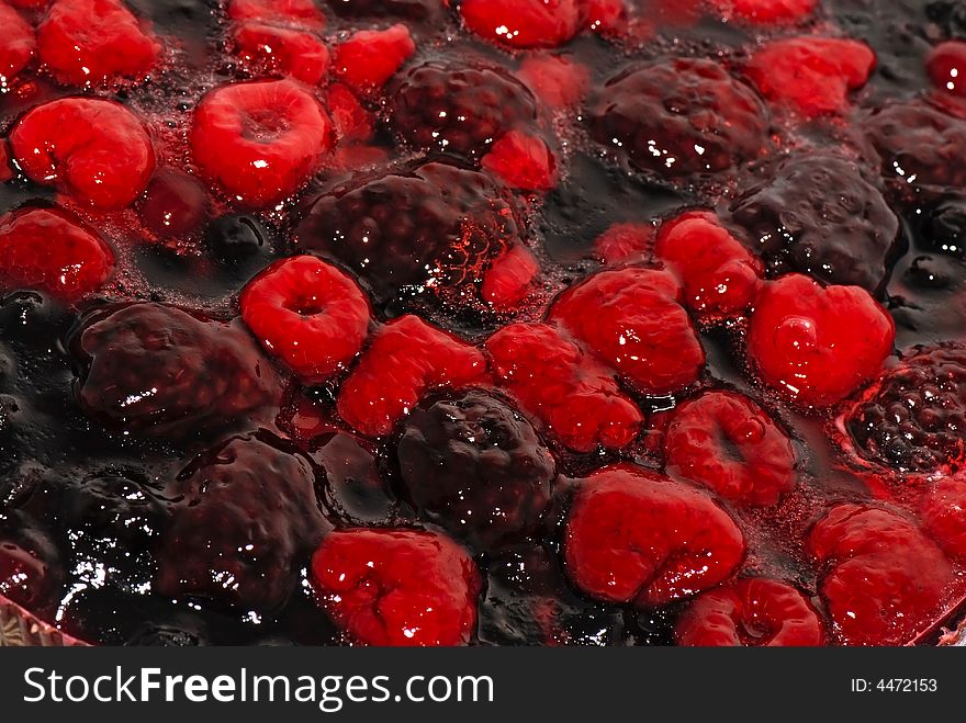 Some different berries in jelly. Some different berries in jelly