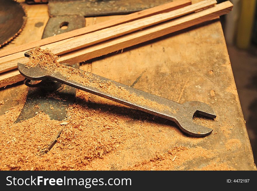 A old wrench in a carpenter table