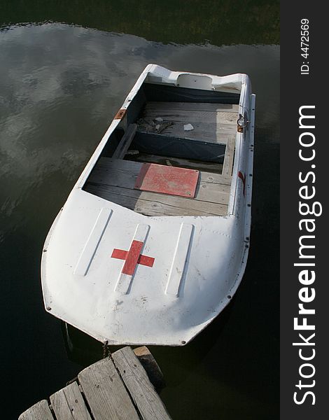 Lisesaver boat on the lake with reflection