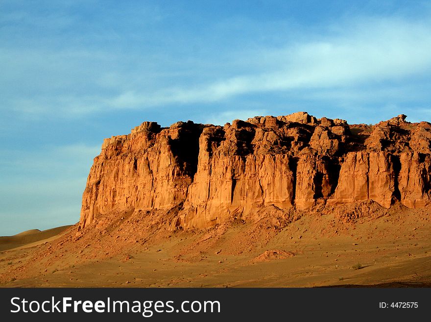 Golden rocky wall sunset