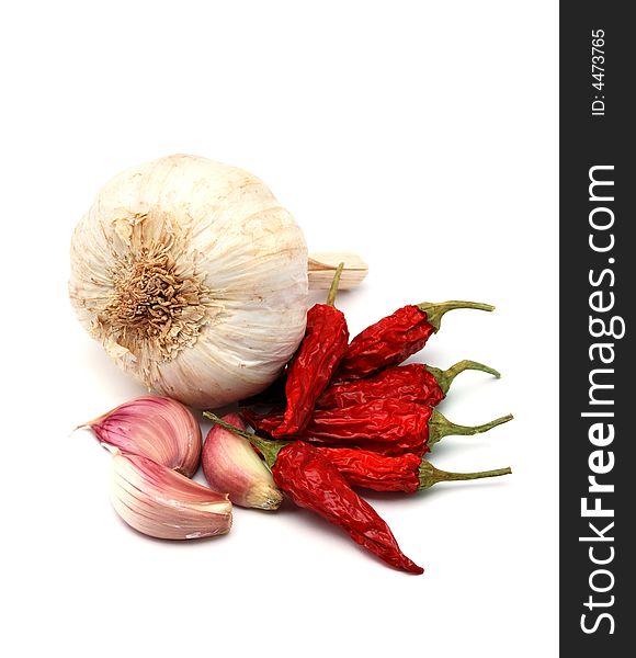 Garlic and chili pepper, a tipical seasoning for italian spaghetti. Garlic and chili pepper, a tipical seasoning for italian spaghetti