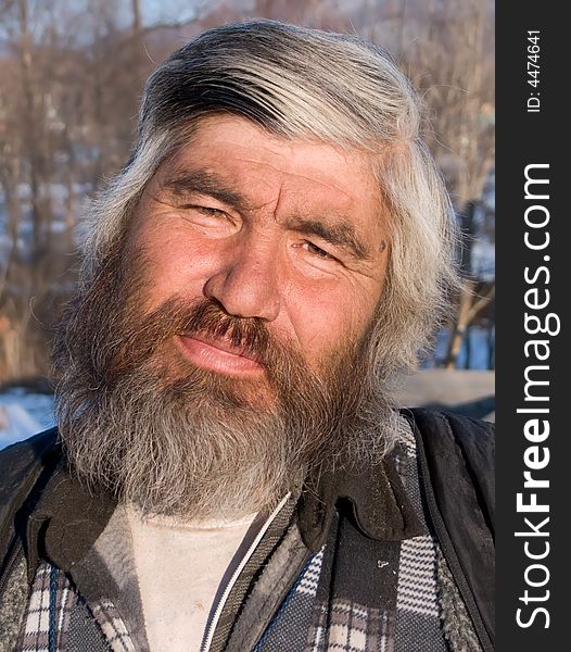 A portrait close-up of the men, the representative of one of small indigenous peoples of Russian Far East. His name is Valery Eusan. Primorsky Region, settlement Preobrazhenie. A portrait close-up of the men, the representative of one of small indigenous peoples of Russian Far East. His name is Valery Eusan. Primorsky Region, settlement Preobrazhenie.