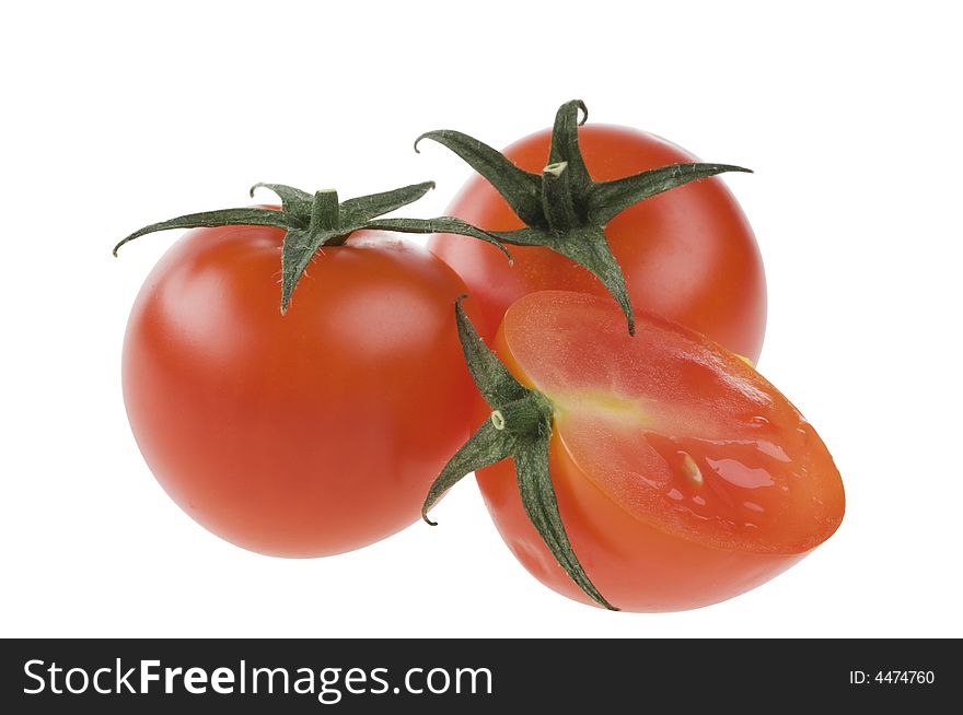 Isolated red ripe tomatoes over white background