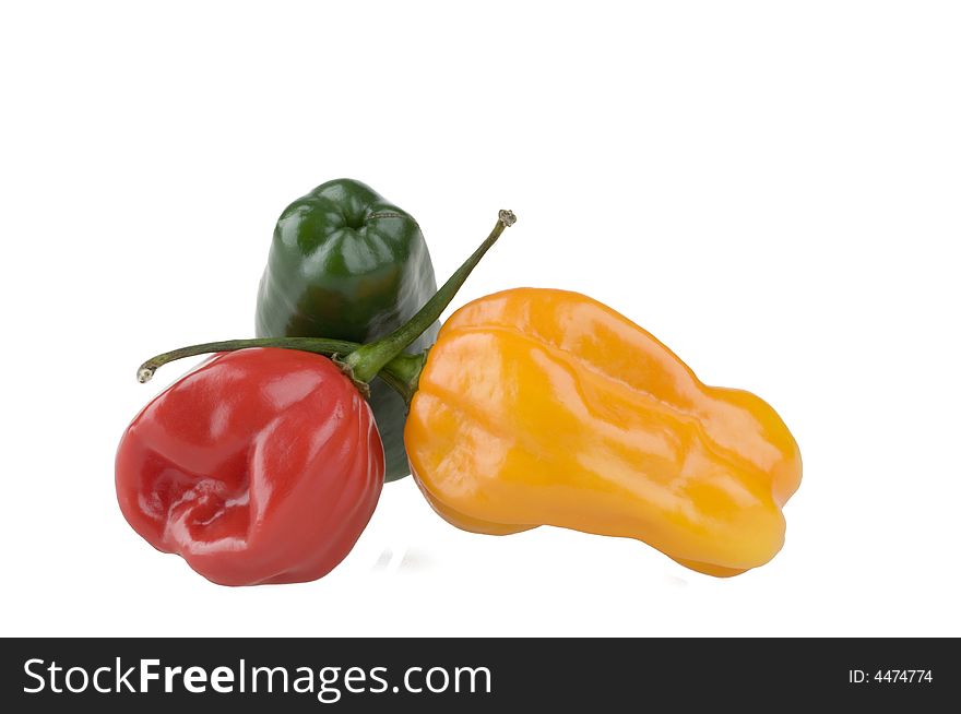 Multicolor hot peppers isolated  on a white background. Multicolor hot peppers isolated  on a white background