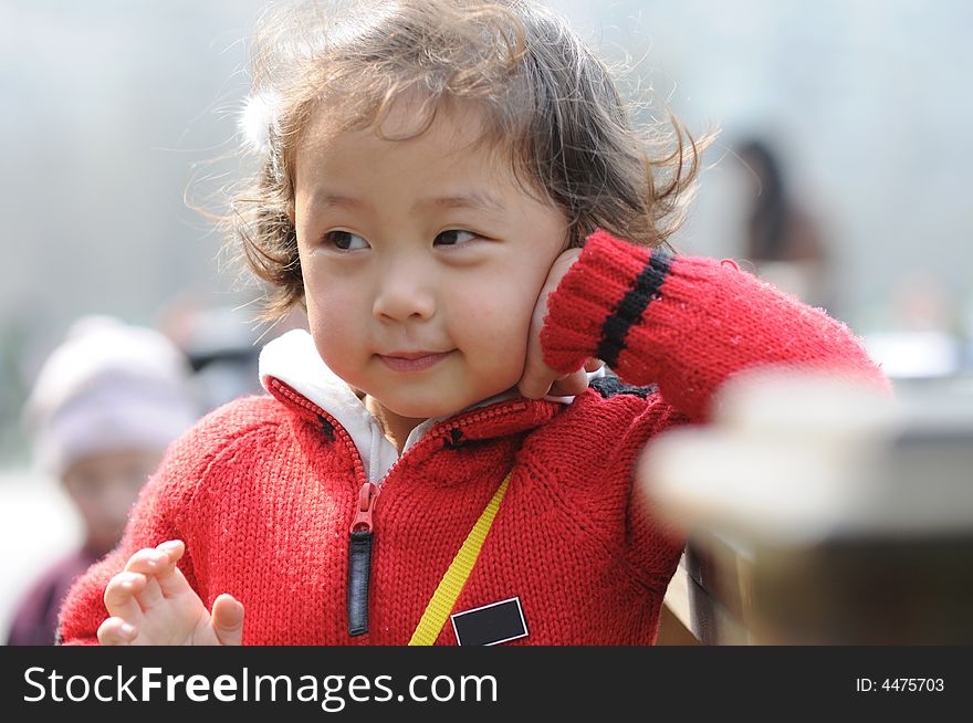 A beautiful girl in redï¼Œwith smile