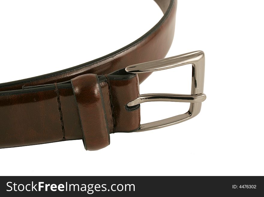 A Isolated brown leather belt with buckle