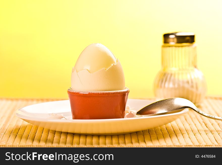 Food series: white boiled egg and spoon