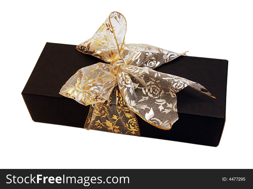 Black Gift Box with Gold Ribbon against White background