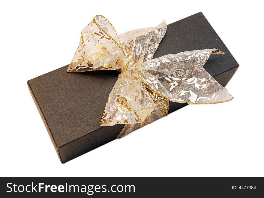 Black Gift Box with Gold Ribbon against White background