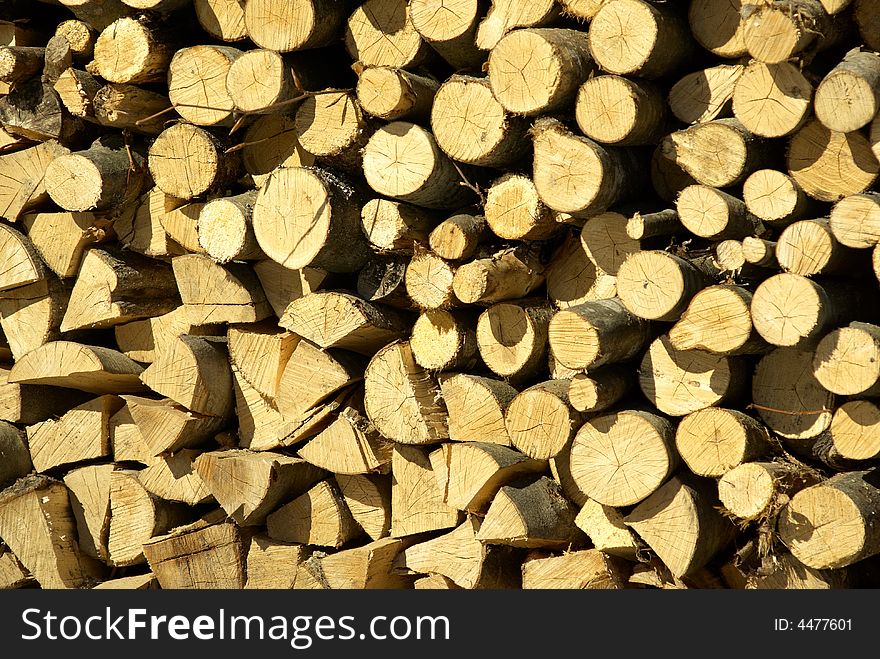 The cut and chopped fire wood are stacked in a heap