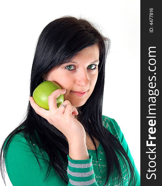 A girl with a green apple. A girl with a green apple