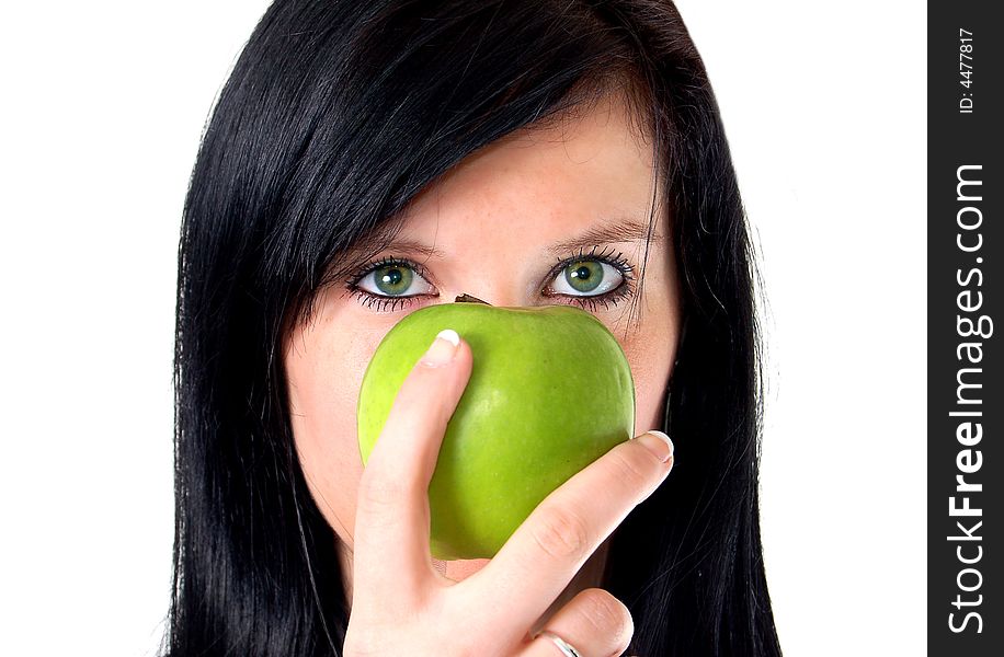 A girl with a green apple. A girl with a green apple