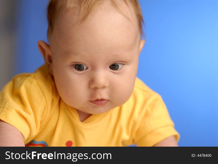 A baby in yellow on exploration