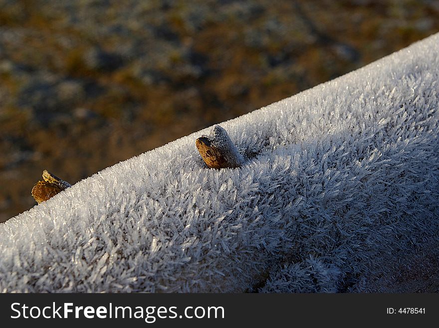 Natural frost on wood beam