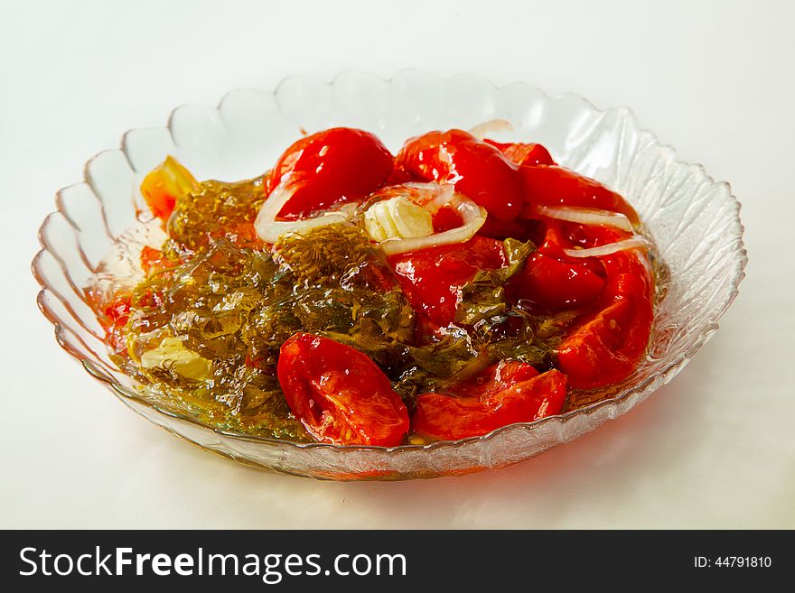 Marinated Tomatoes On A Plate Of Home Cooking
