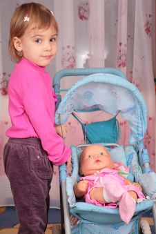 Small Girl With Doll In Carriage 2 Stock Image Small Girl With Doll In Carriage 2 Stock Image