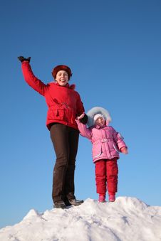 Mother And Child Stand On Top Of Snowy Hill Stock Photos Mother And Child Stand On Top Of Snowy Hill Stock Photos