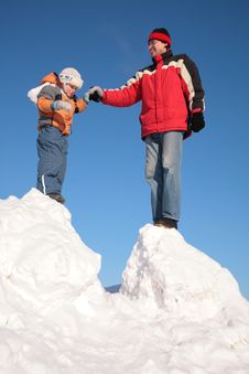 Father With Child Stand On Snow Hill Royalty Free Stock Photography Father With Child Stand On Snow Hill Royalty Free Stock Photography