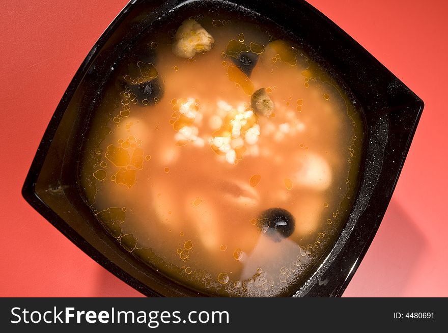 Soup with bean, olives and pasta