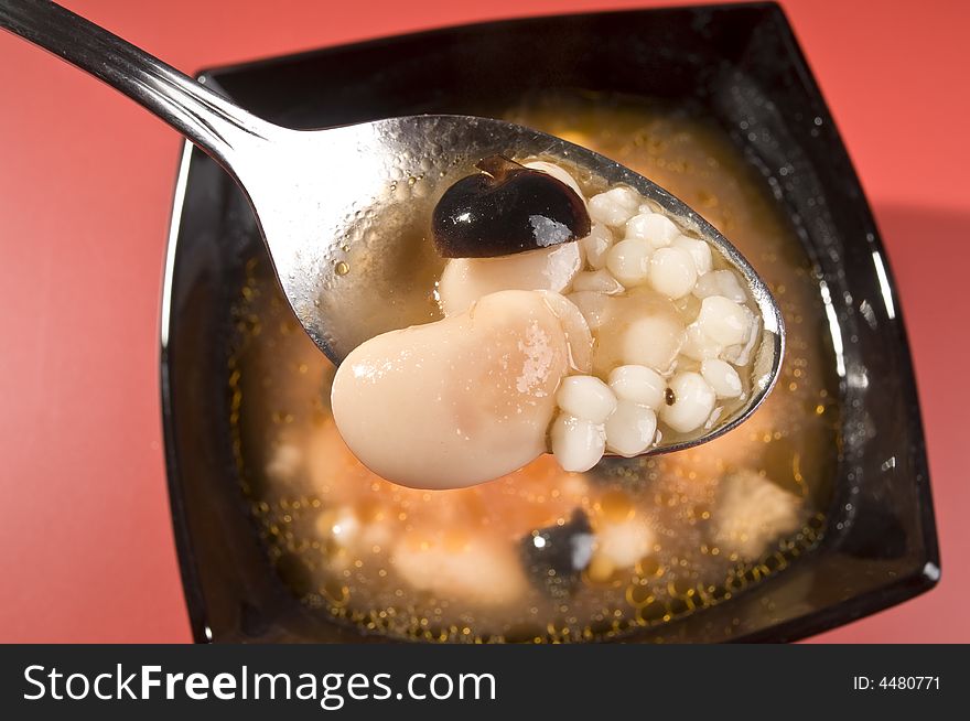 Soup with bean, olives and pasta