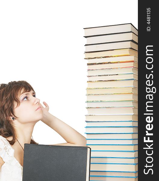 Schoolgirl with a pile of books. Schoolgirl with a pile of books