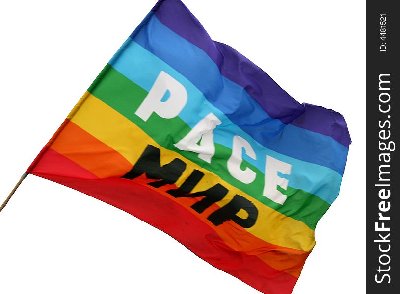 Multi-coloured flag with an inscription the peace