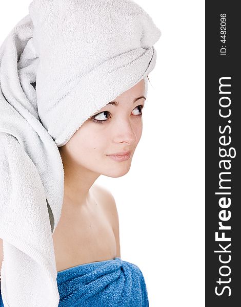 Young woman looking with a towel on her head. Young woman looking with a towel on her head