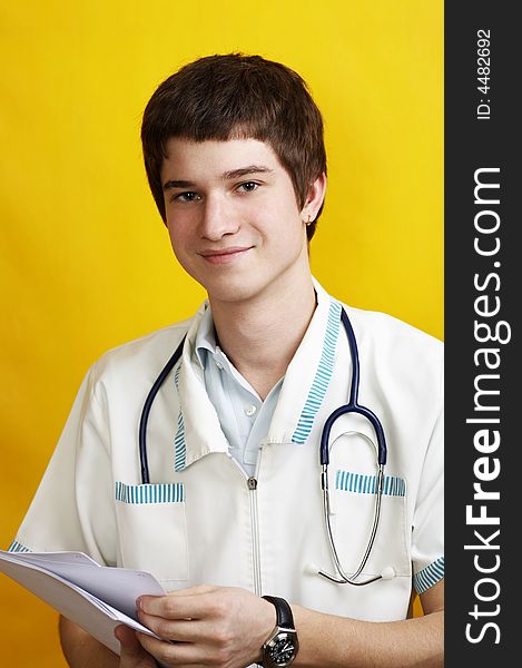 Young handsome caucasian doctor with stethoscope