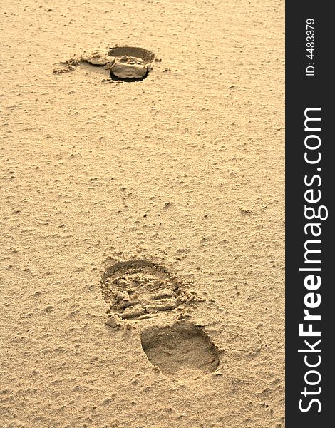 Footprints made by human on beach sand. Footprints made by human on beach sand.