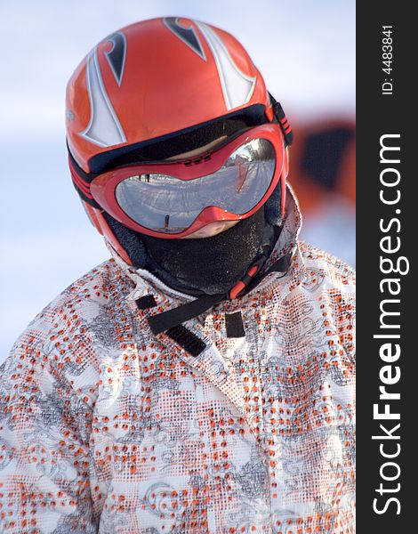 Man with helmet and glasses for mountain ski