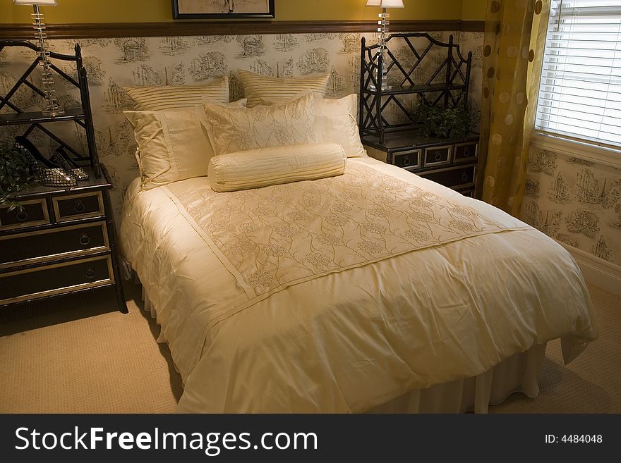 Designer bedroom with contemporary furniture and decor. Designer bedroom with contemporary furniture and decor.