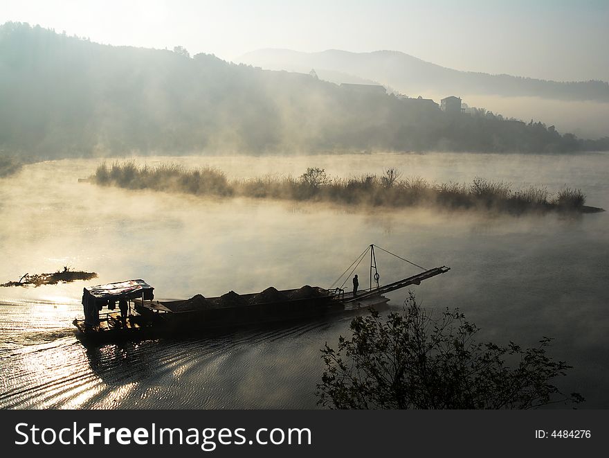 Fog in the morning sailing boat