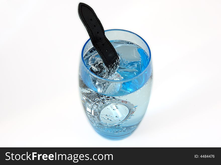 Waterproof watch in water glass full of water. Service test. Waterproof watch in water glass full of water. Service test.