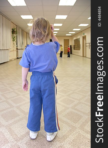 Little girl in a gym