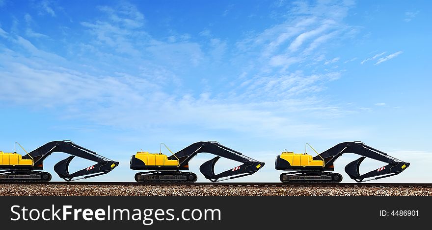 Power-shovels, transported on low railway platforms on a parallel way, to subjacent, it seems therefore, that they cost on the rails of railway. Power-shovels, transported on low railway platforms on a parallel way, to subjacent, it seems therefore, that they cost on the rails of railway.