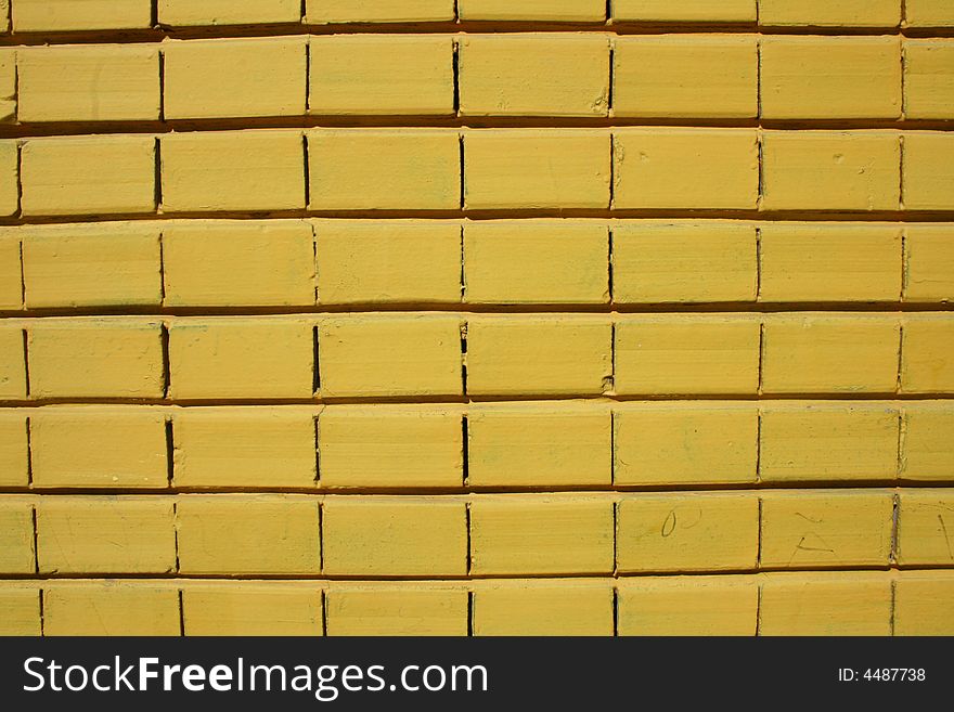 Yellow blocks, wall of a house