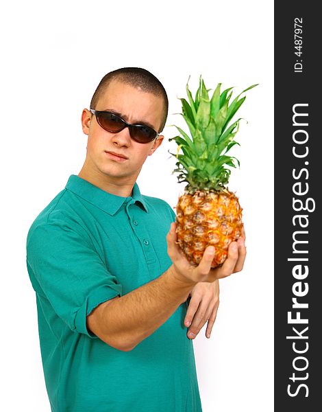 Boy with big orange-green pineapple. Boy with big orange-green pineapple