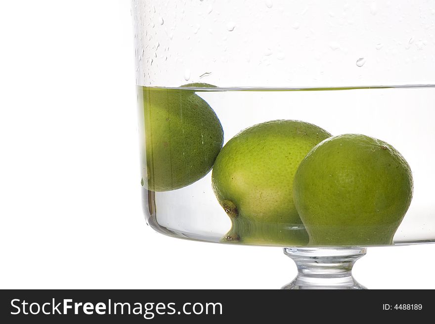 Fresh lemon splash into water on the white background