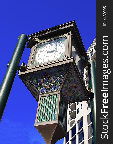 Outdoor art deco clock in the down town area. Outdoor art deco clock in the down town area