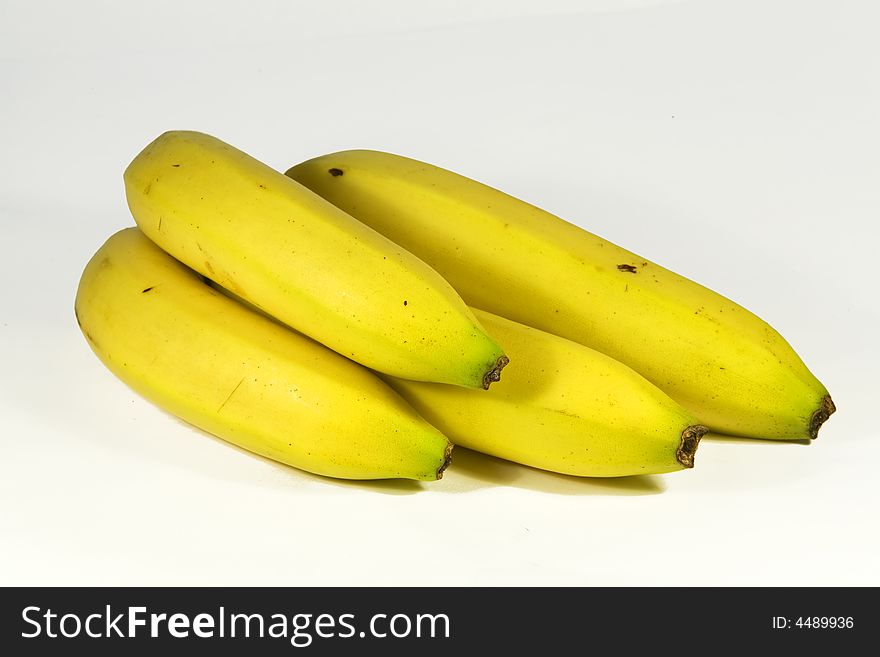 Bunch of yellow bananas isolated on white