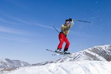 Snow Skier Jumping Over Blue Sky Royalty Free Stock Photography