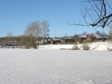 Small Village Near Frozen Lake Royalty Free Stock Photo