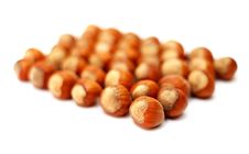 Hazelnuts On A White Stock Photos