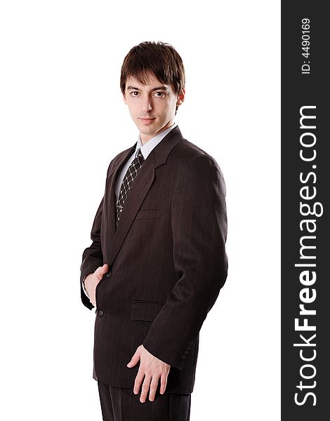 Young man in dark suit on white background