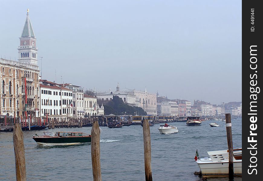 Venice, Italy: view across busy Canal Grande to Venetian palaces, Campanile San Marco (church tower) and Doge's Palace. Venice, Italy: view across busy Canal Grande to Venetian palaces, Campanile San Marco (church tower) and Doge's Palace